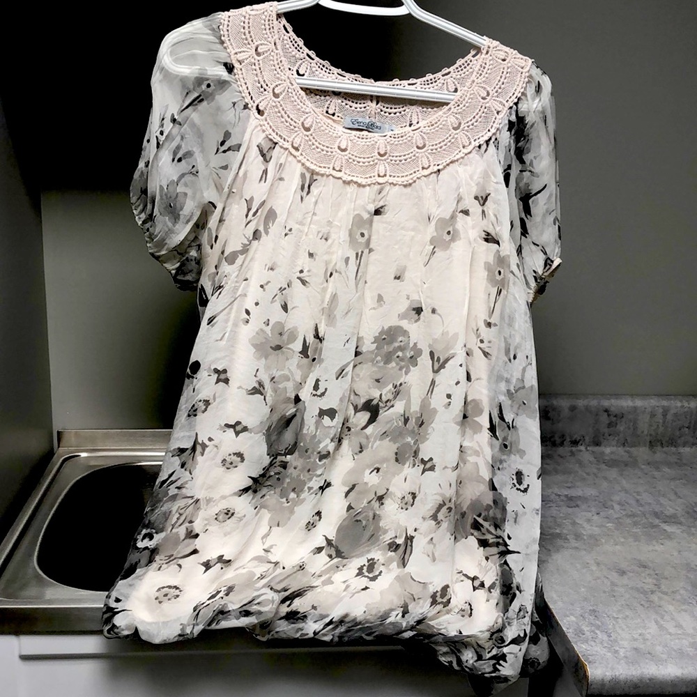Silky flowy black and white blouse with lace detail